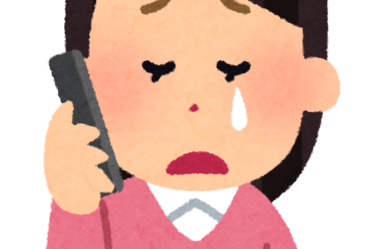 電話泣く女性